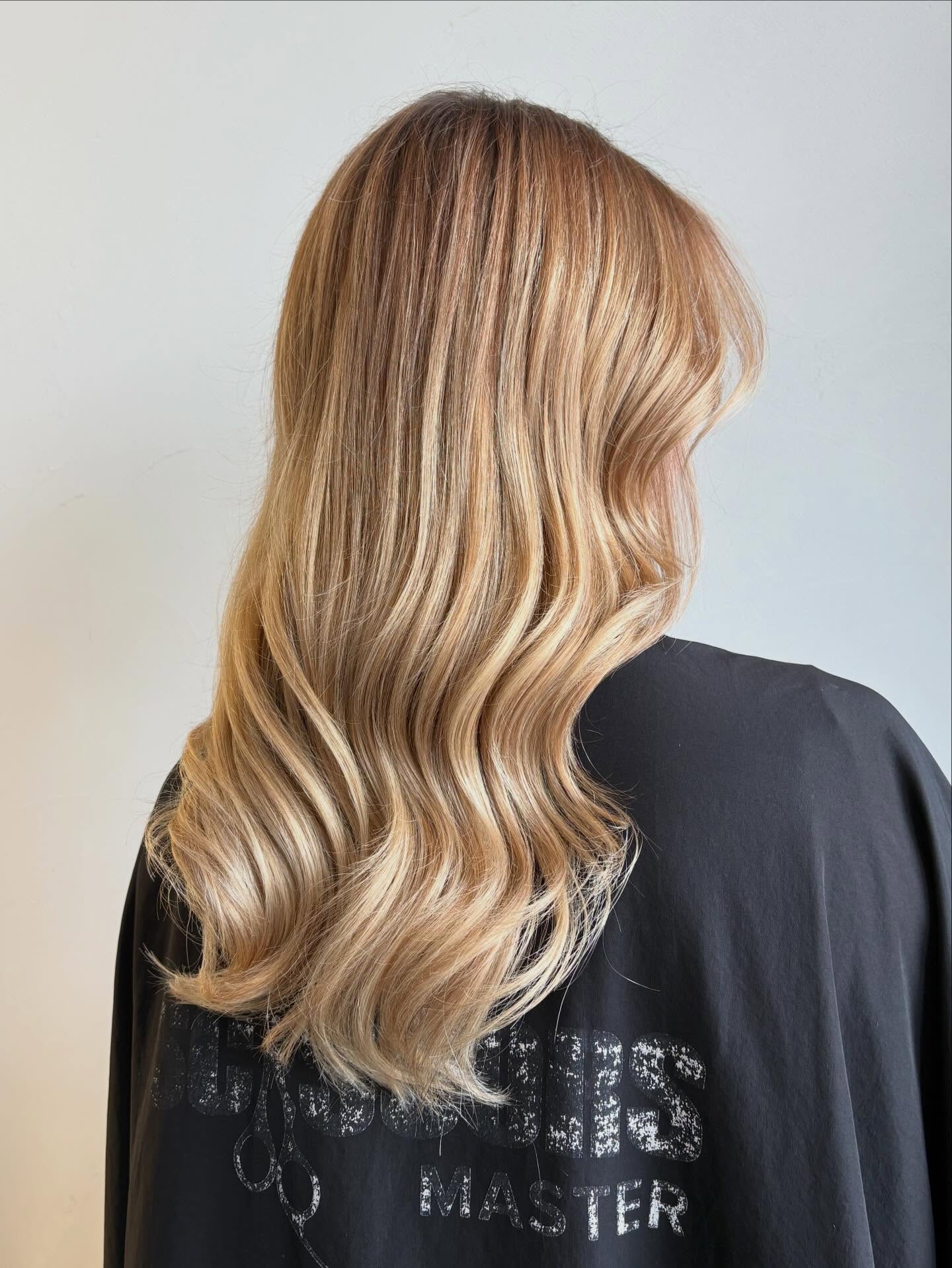 Hair styled by Camille Marchand